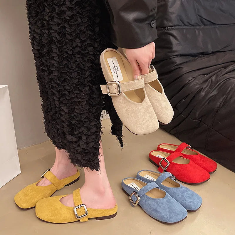 Women's flat closed toe half slippers in apricot, blue, red, or yellow with a square toe and rubber sole.