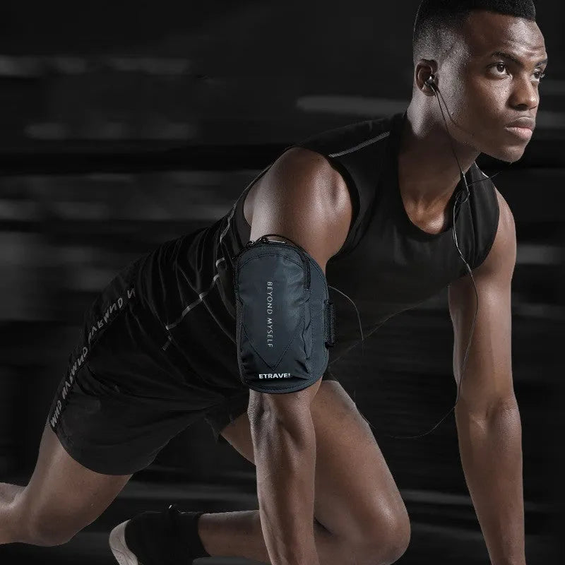 Reflective black running arm band with adjustable strap, shown holding a smartphone.