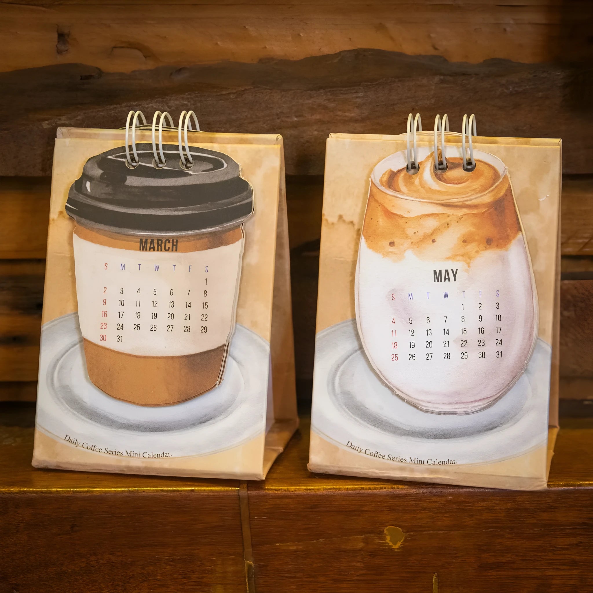 Mini 2025 desk calendar showing multiple design options including Coffee Time and Life Is Not Easy themes
