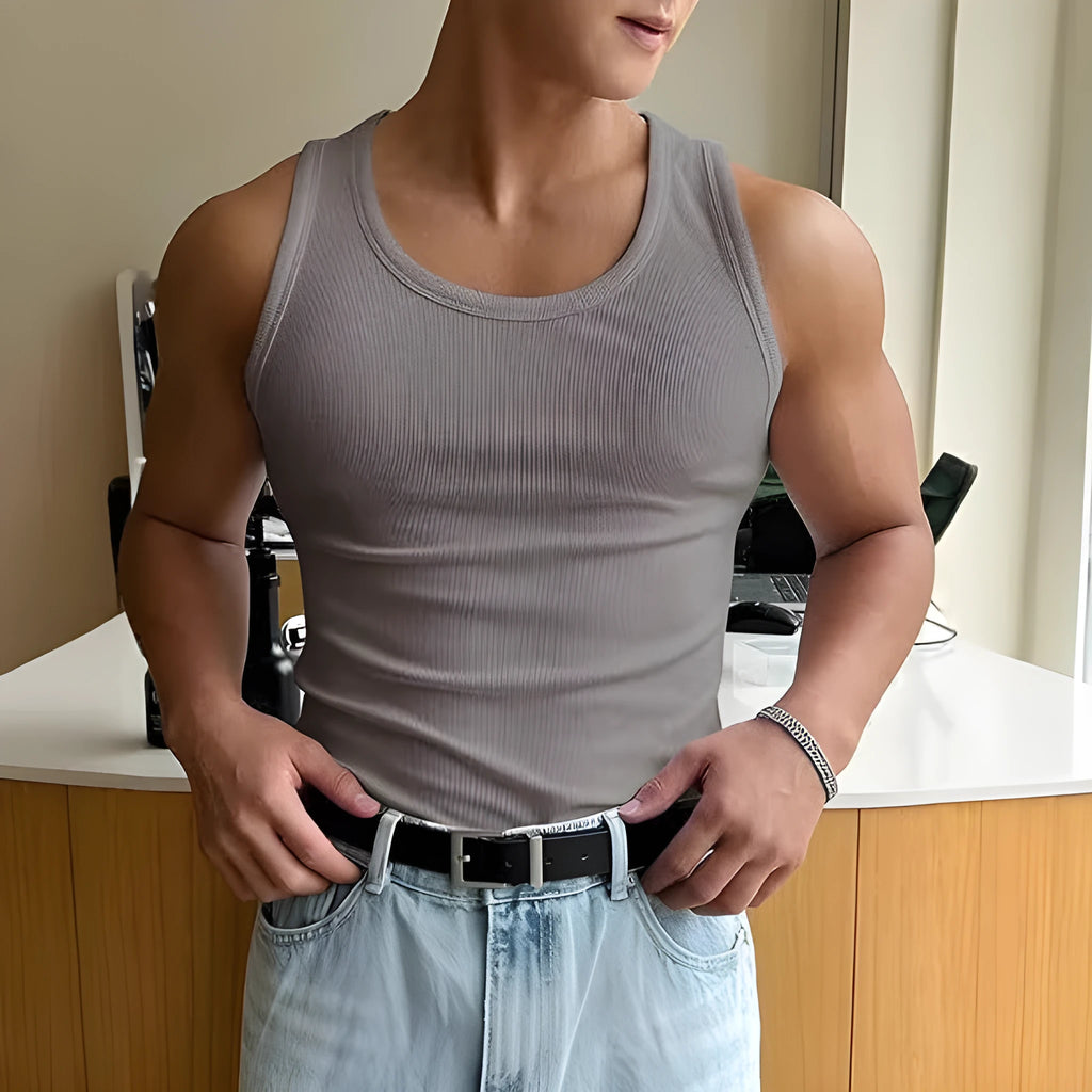 Men's round neck grey fitness T-shirt with a wool lining, shown in a tight, sporty fit.