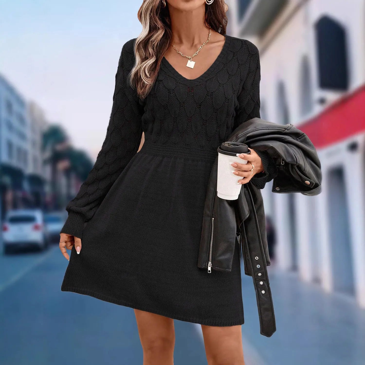Apricot coloured V-neck long sleeve dress with a high waist and 3D pattern details.