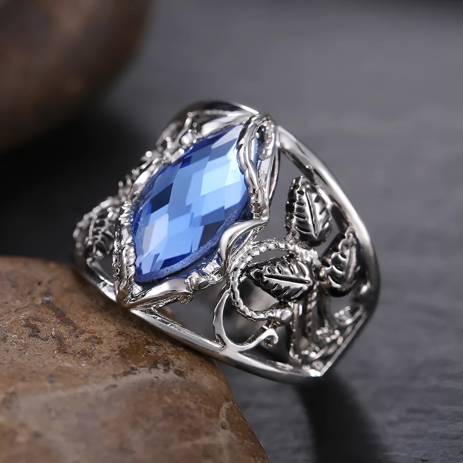 Blue horse eye geometric alloy women's ring with crystal inlay detailing showing side profile