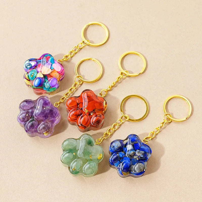 Natural crystal cat's paw keychain pendant on a metal ring in one of ten random stone colours.