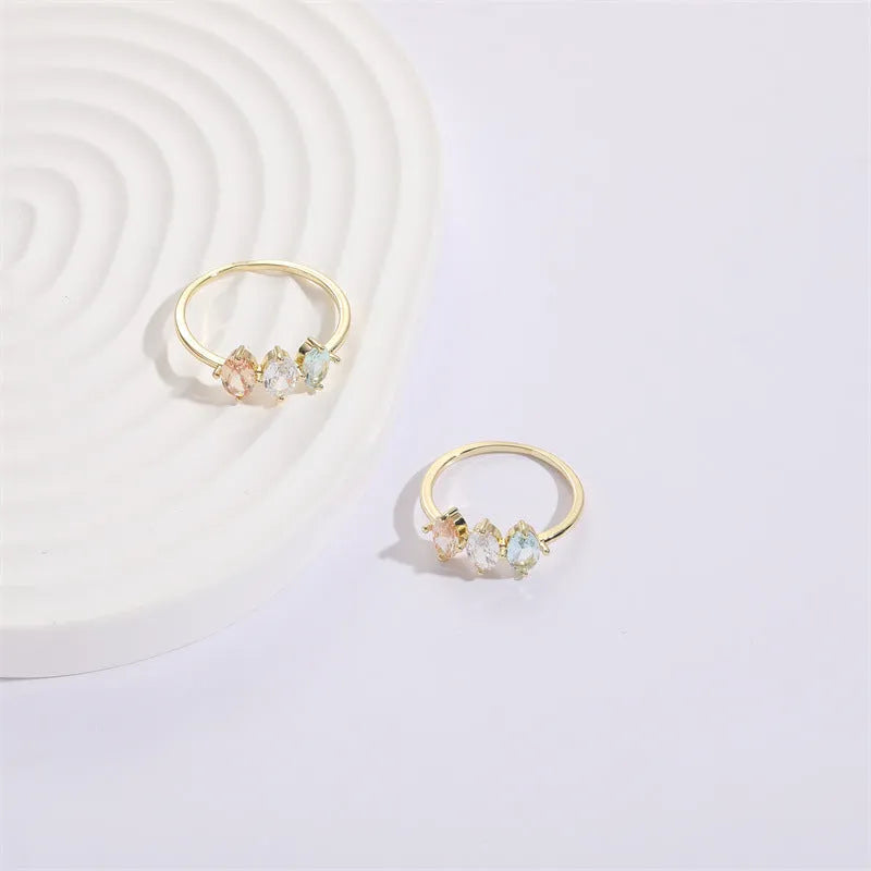 Geometric triangle women's ring with horse eye tricolour zircon stone in electroplated 14k gold colour