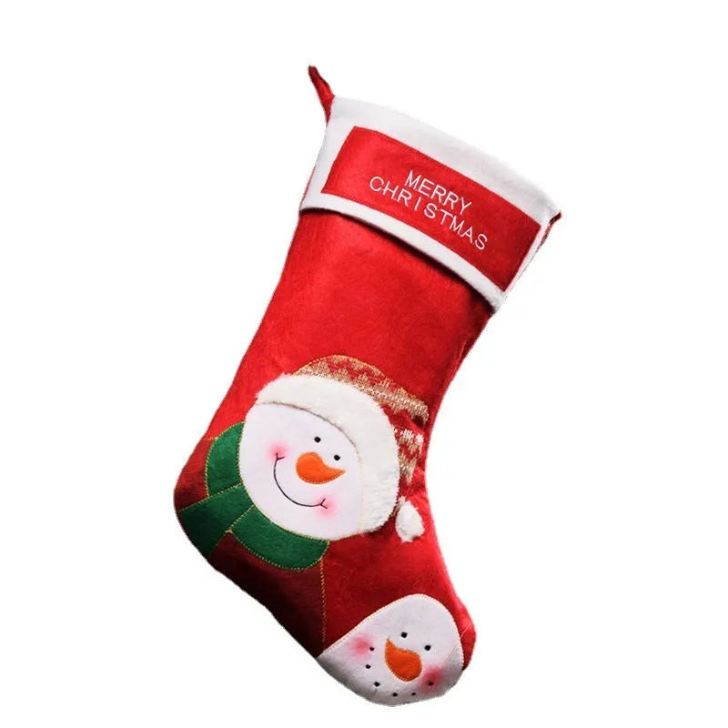 Red Christmas stocking with elk, old man and snowman printed designs in traditional American style