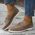 Casual apricot coloured canvas slip-on loafers with a round toe and platform heel.