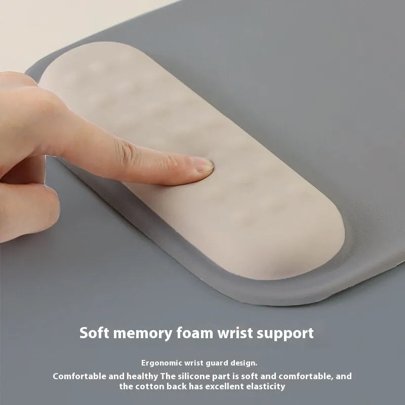 Ergonomic cloth silicone mouse pad with wrist strap in a choice of solid and gradient colours.