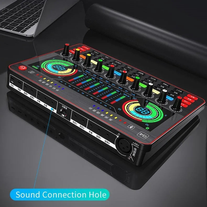 G4 professional USB sound card with LCD display, microphone, remote control and audio cables on a desk