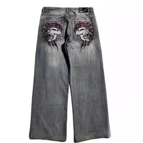 Grey washed-out wide-leg denim jeans for men with a retro workwear design and straight leg opening.
