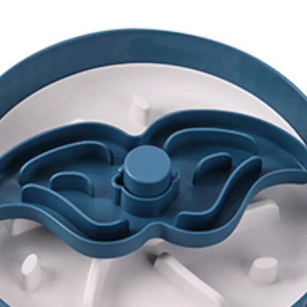 Pet slow feeder bowl with silicone licking mat in rotating game board design