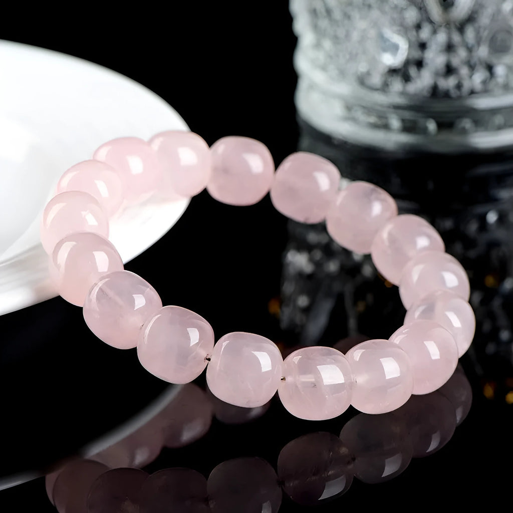 Pink bamboo crystal bracelet with 11mm barrel beads in original geometry design
