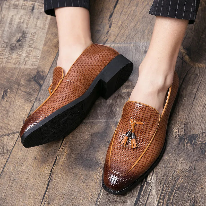 Men's black pointed toe slip-on business shoes with tassel detail on artificial PU upper