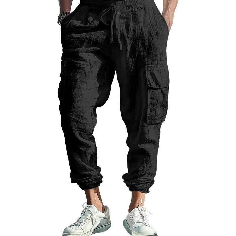 Men's linen casual trousers with ankle-tied cuffs and multiple pockets in solid colours