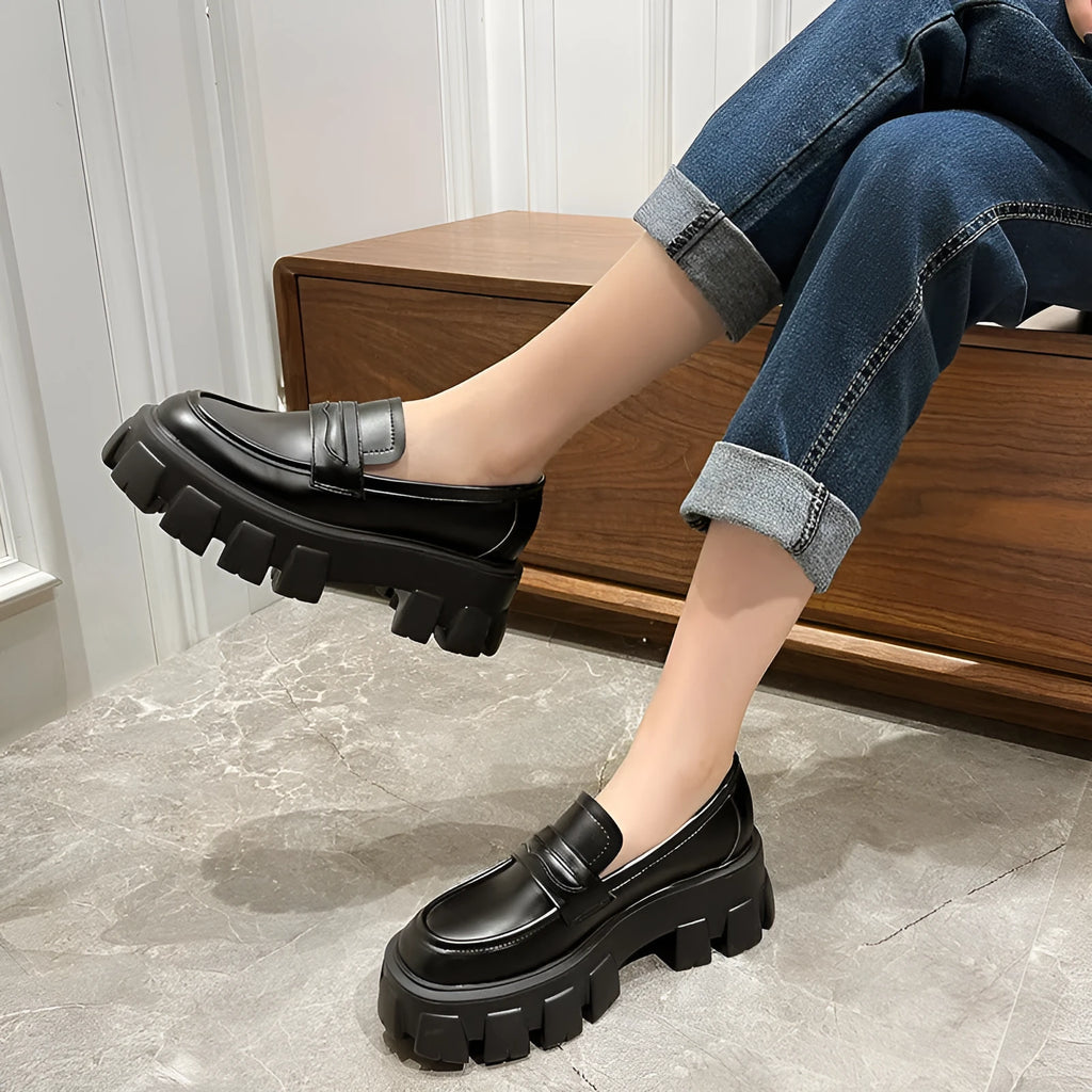 British style wide fit loafers in patent leather or matte finish with rubber sole.