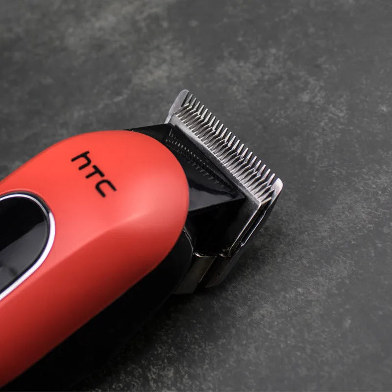 Professional digital electric hair clipper in black, red, or white with USB charger and 4 limiting combs.