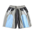 Blue patchwork quick-drying men's beach shorts with loose straight-leg fit for outdoor sports