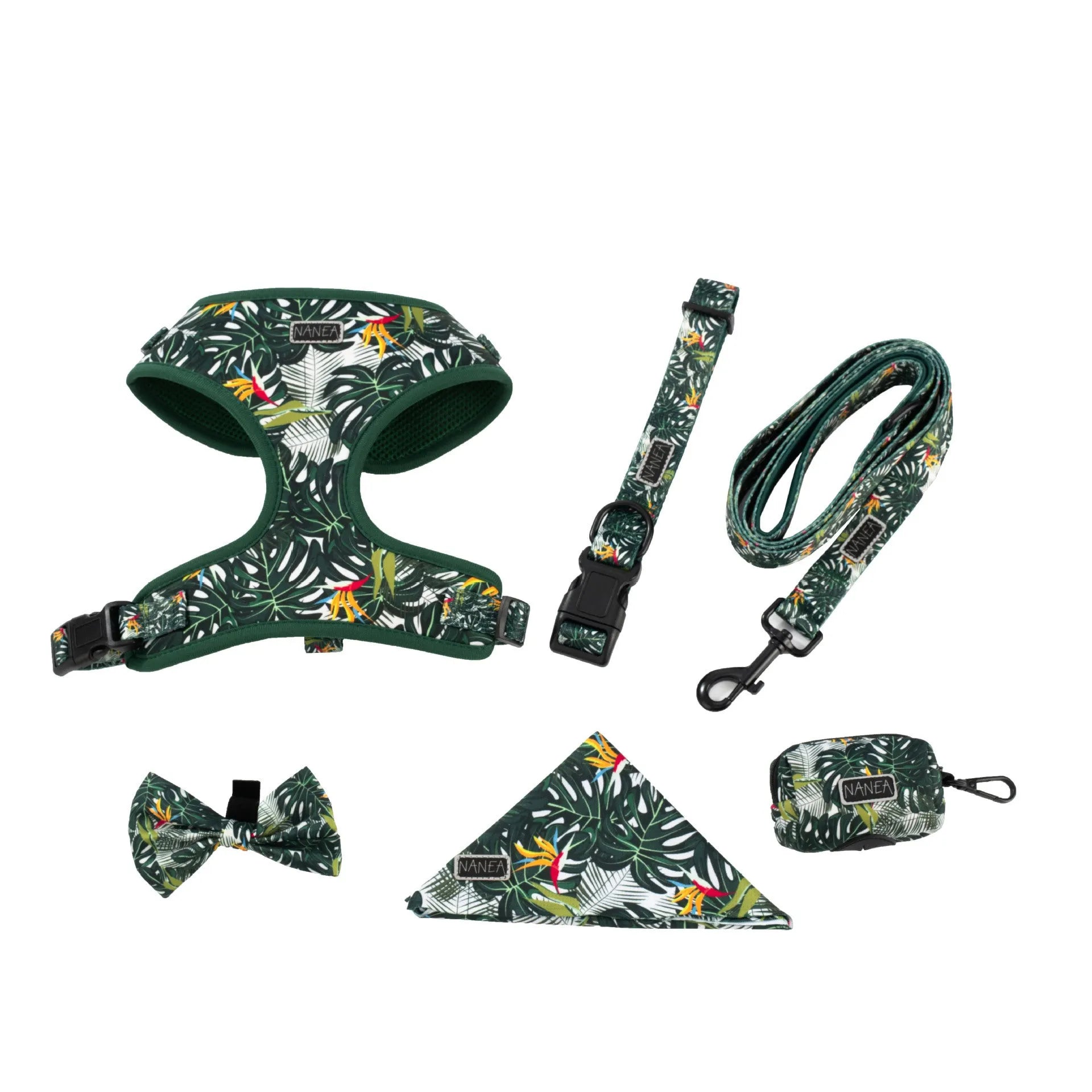 Six-piece dog harness set showing cloth vest, leash, collar, waste bag, bow tie, and scarf laid out