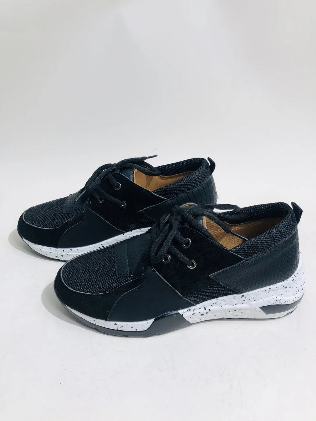 Women's casual suede flat sneakers with wedge heel in black, leopard, pink, panther, and snake pattern options.