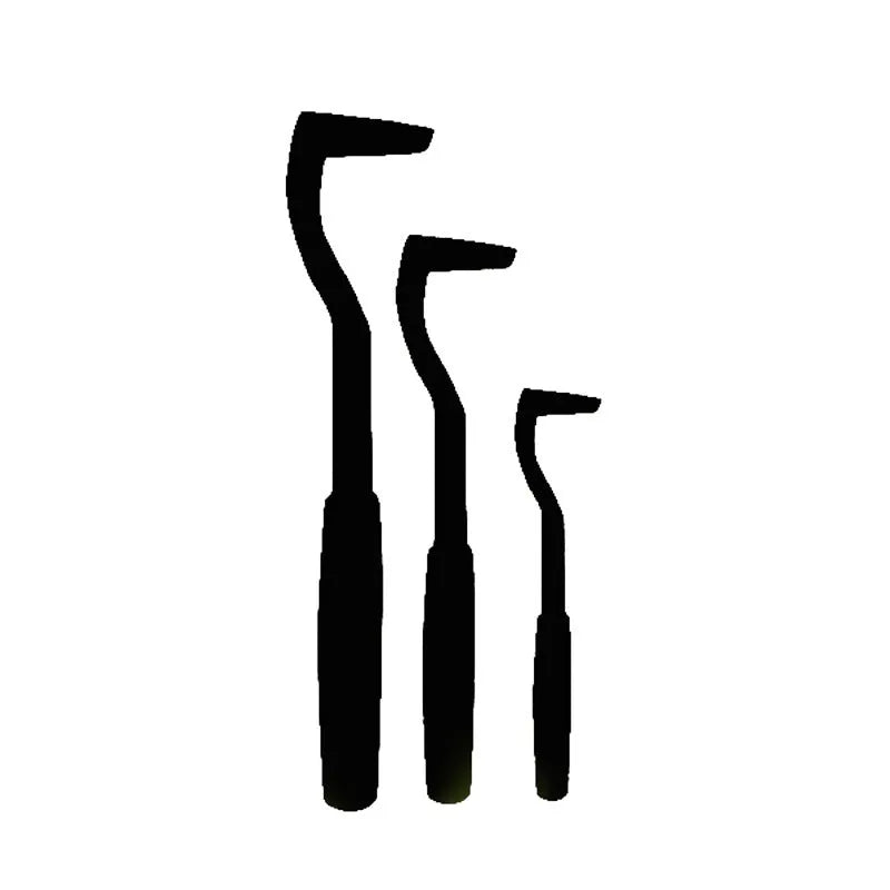 Three plastic tick hooks for dogs in assorted colours on a white background.