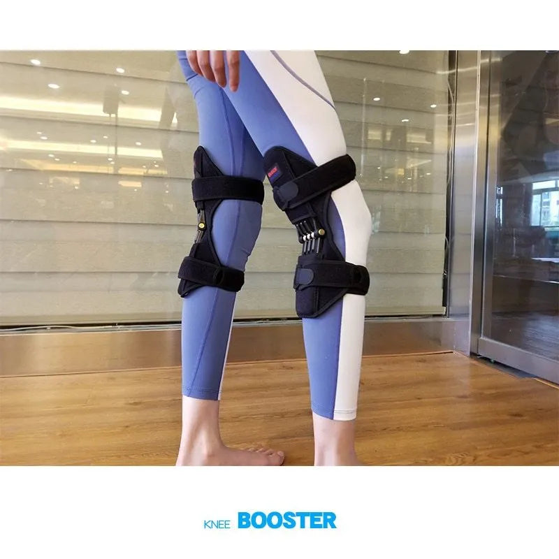 Adjustable knee brace with patella booster spring system in black, blue or green colours