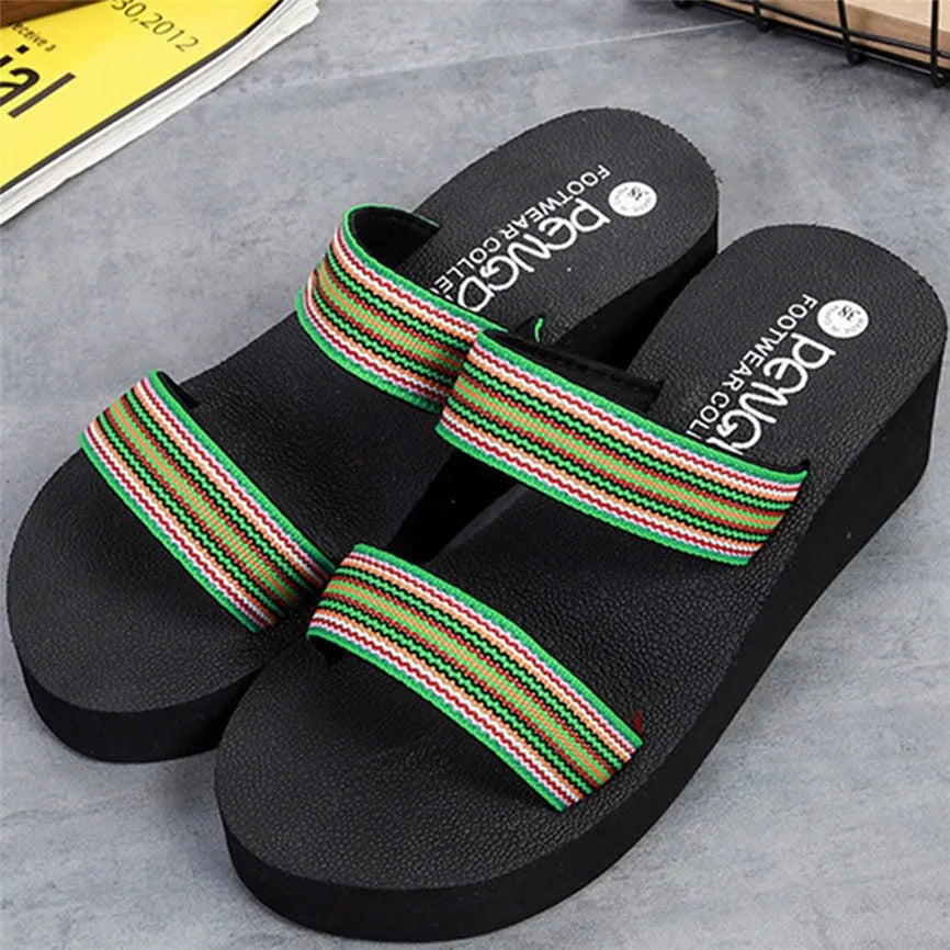 Brown women's bohemian slippers with an elasticated upper and adjustable ankle strap on a rubber sole.