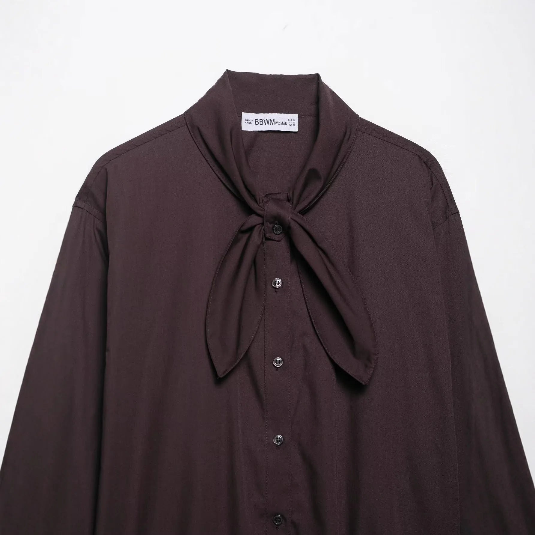 Brown women's poplin shirt with long sleeves and bow tie detail