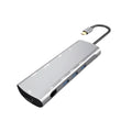 Grey aluminium USB-C docking station with HDMI, VGA, USB 3.0, and PD charging ports
