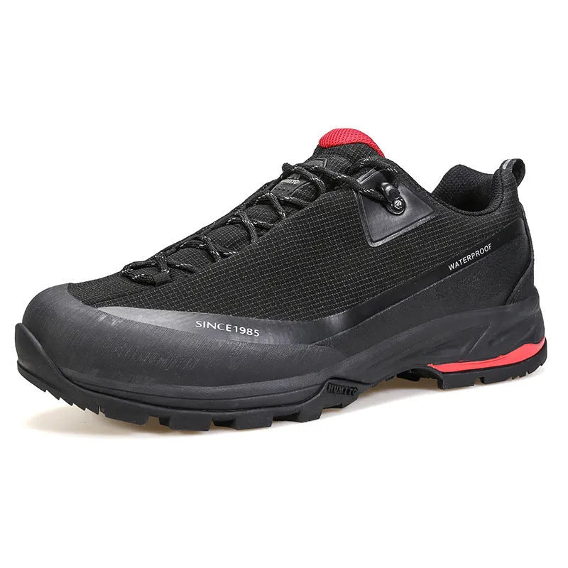 Low-top mountain climbing shoes with leather mesh upper and non-slip rubber sole in black-red and beige-maroon colour options for men and women.