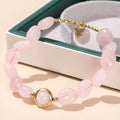 Handmade crystal agate bracelet with natural gemstone beads and a decorative charm