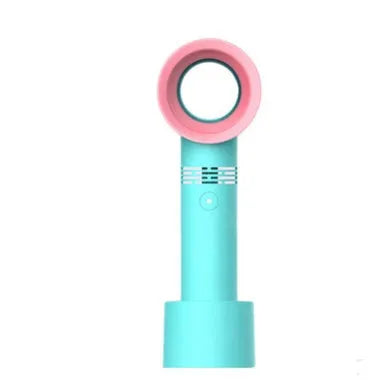 Compact portable bladeless fan in chosen colour on its base, with USB cable for charging.