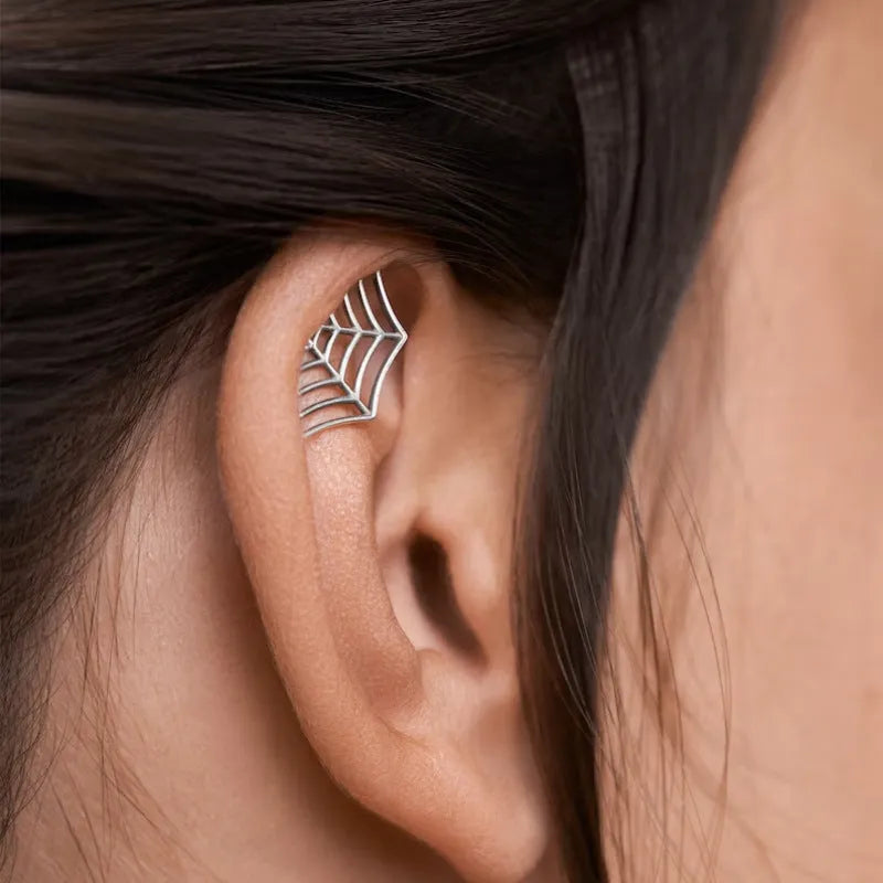 Spider web stud earrings with geometric mesh design in gold and silver electroplated metal
