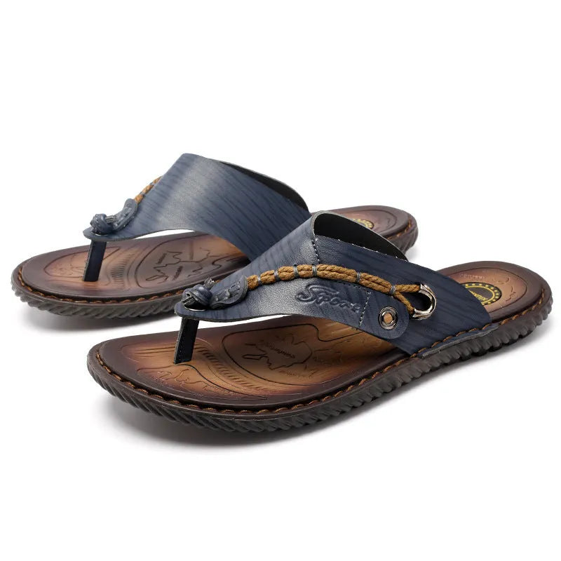 Men's dark blue herringbone pattern outdoor slippers with a leather lining and rubber sole.