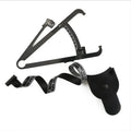 Black ABS plastic body fat caliper skinfold measuring instrument on a tape measure