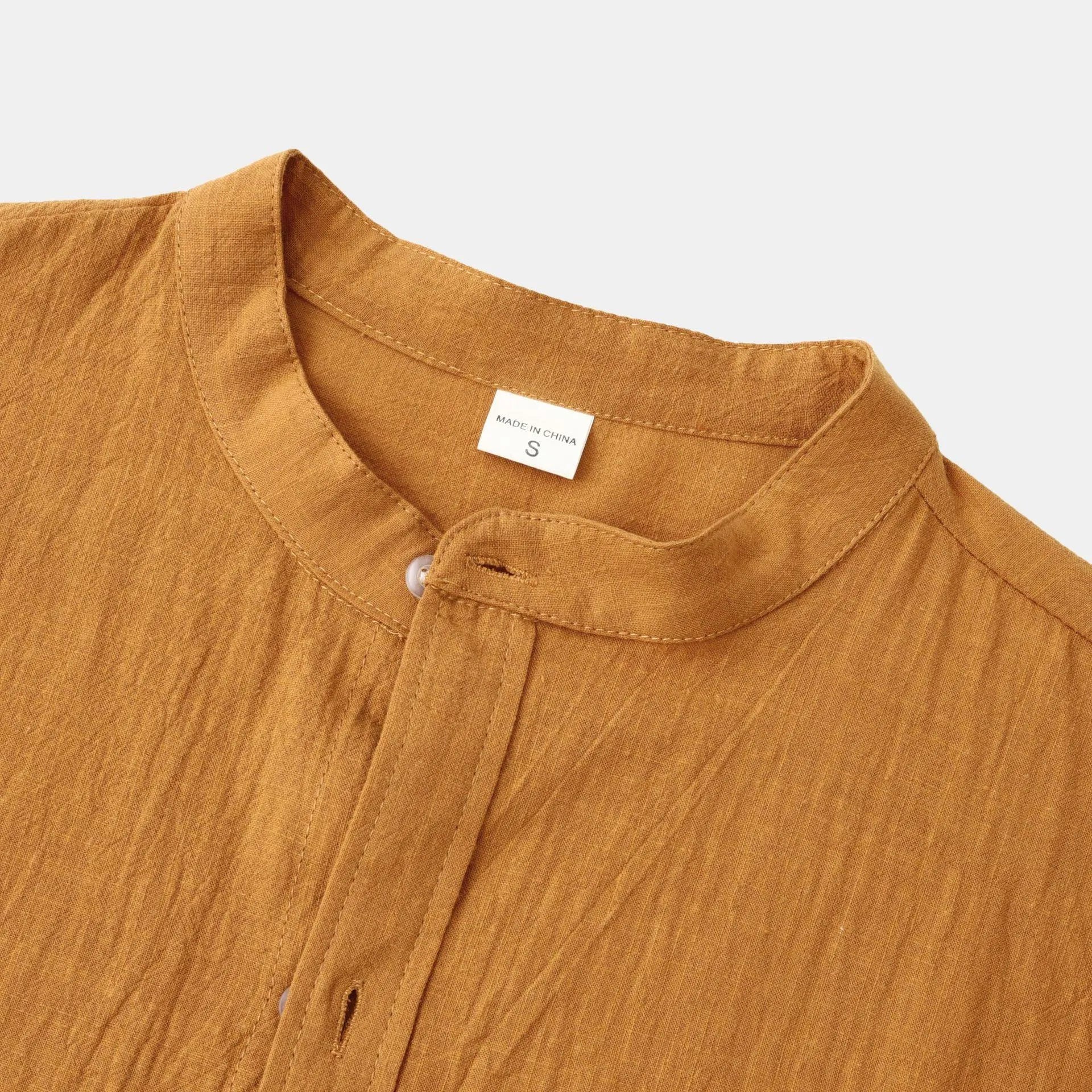 Men's brown slim fit long sleeve cotton blend shirt laid flat.