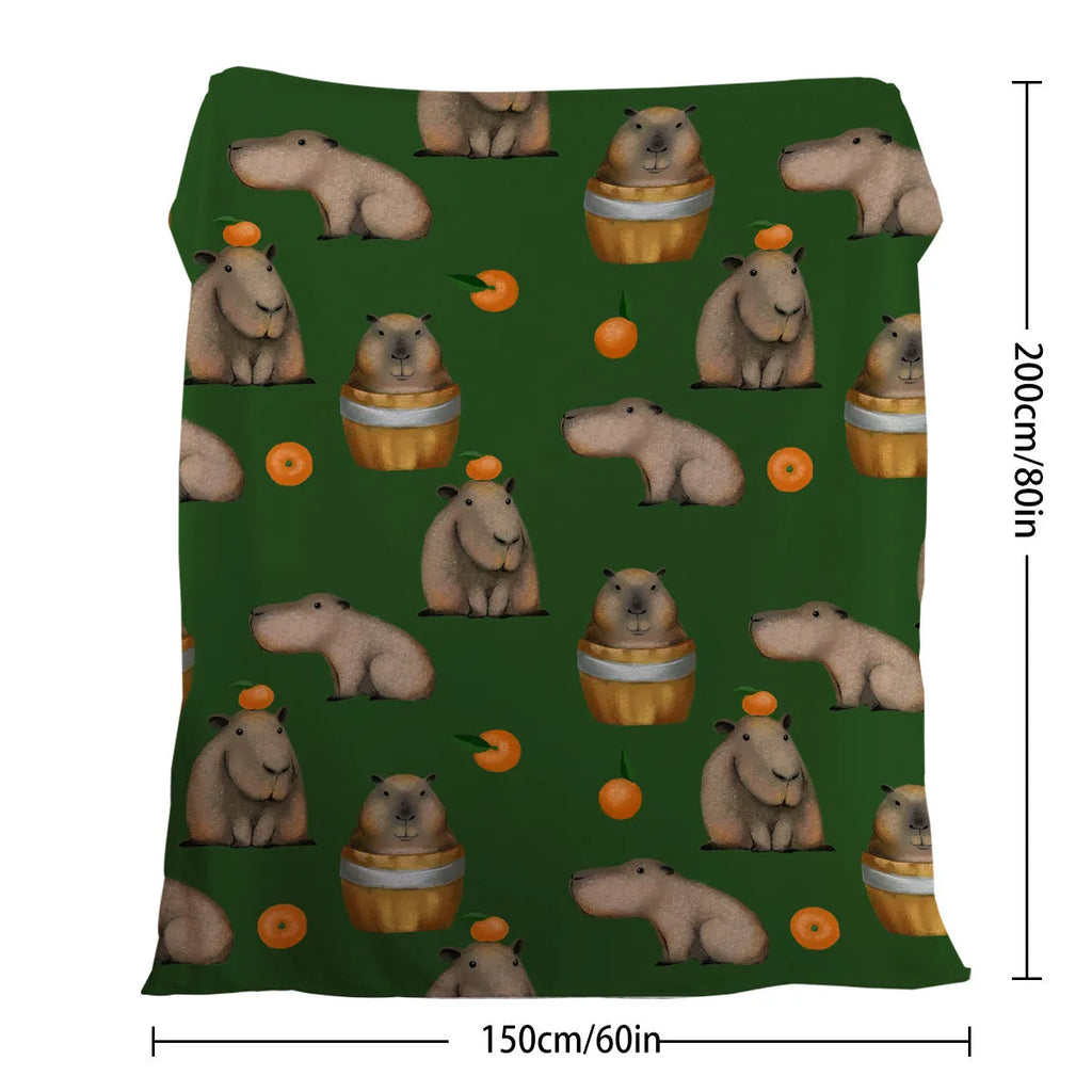 Flannel fleece blanket with orange capybara print, soft fluffy throw in three sizes with hemmed edges.
