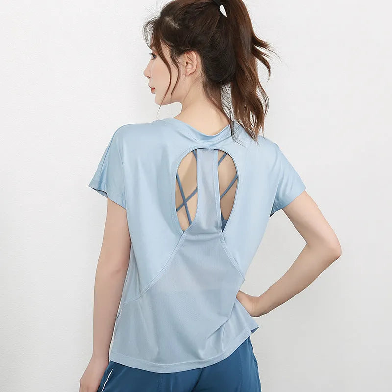 Women's polyester sports T-shirt short sleeve in pink colour for running fitness activities