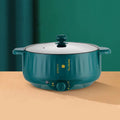 Stainless steel electric hot pot with non-stick interior in green or white finish