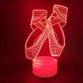 Ballet shoes 3D acrylic LED night light with remote control on wooden surface