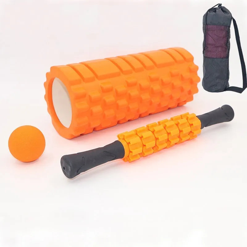 Black fitness foam roller massage bar measuring 33cm long on a plain background.