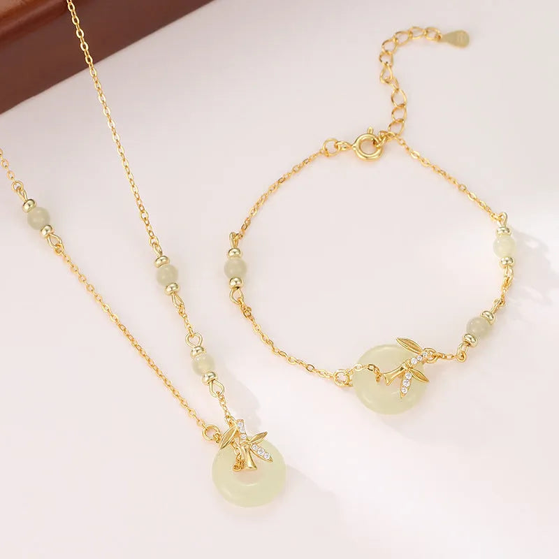 Women's Hetian Jade safety buckle bracelet in antique style with peace buckle detail