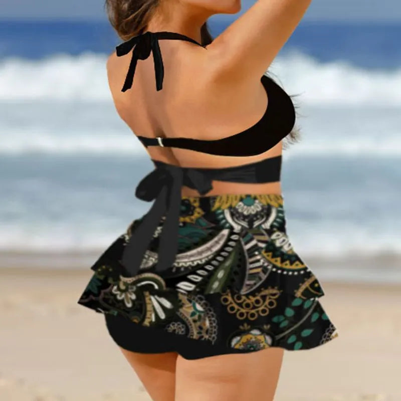 Purple women's high-waisted bikini swimsuit with skirt overlay and lace-up back detail