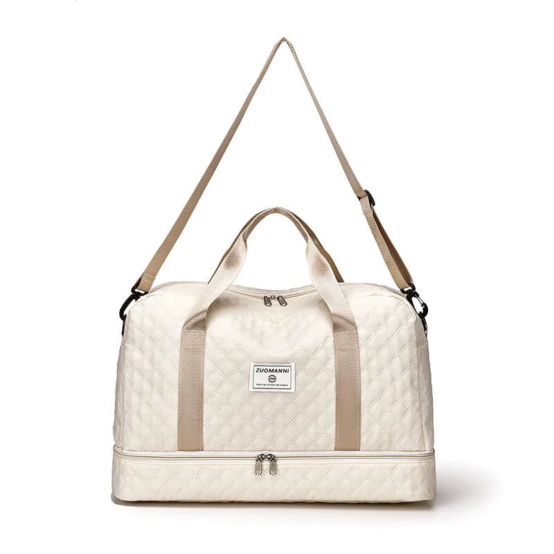 Large oxford cloth leisure travel bag in milky white colour showing storage capacity and carry handles