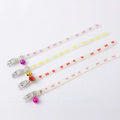 Cat luminous collar with adjustable silicone strap and metal bell showing paw print pattern