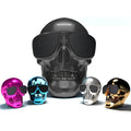 Skull-shaped wireless Bluetooth speaker in black with portable compact design