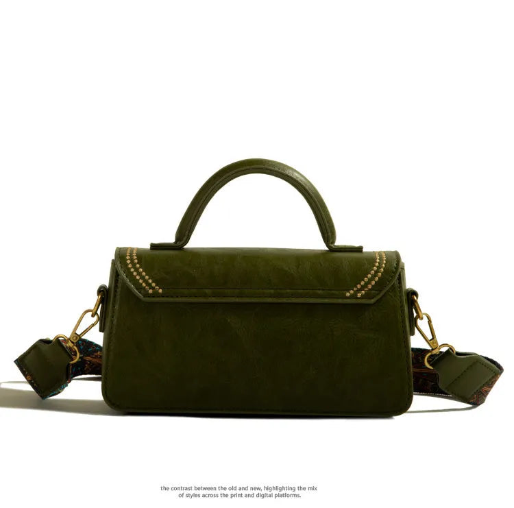 Brown retro texture women's messenger bag showing front sandwich pocket and shoulder strap.