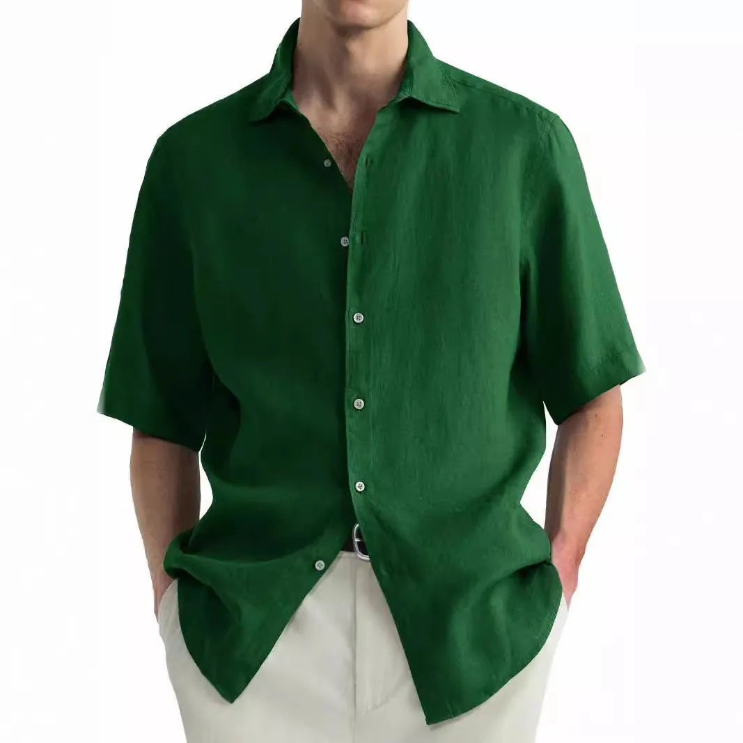 Man wearing a green washed cotton casual shirt with a cardigan style and regular fit