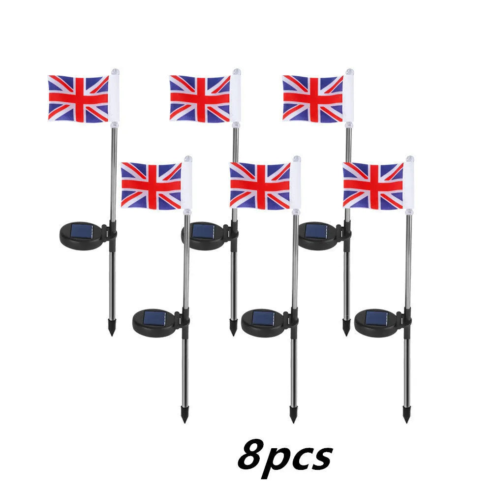 Solar-powered garden flag light with stainless steel pole displaying American or British flag design