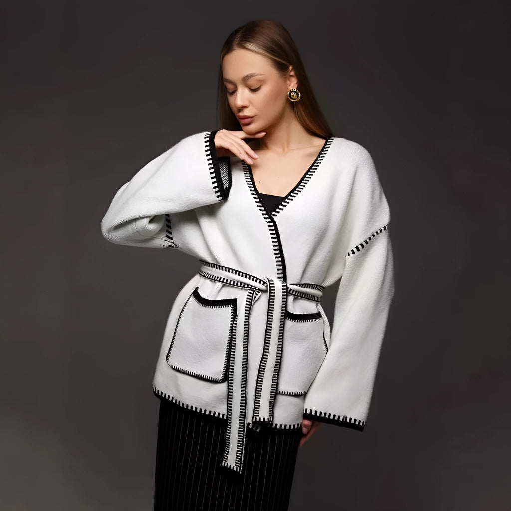 Loose fit knitted cardigan with lace-up front detail in thick imitation cashmere cotton fabric.