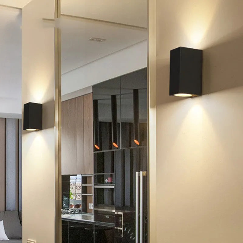 Black aluminium wall lamp with glass shade and integrated LED lighting