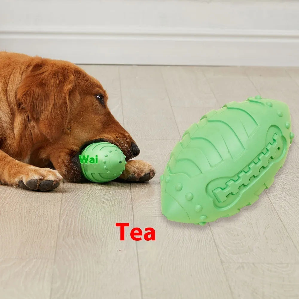 Light green rubber rugby ball dog chew toy with textured surface for teeth cleaning